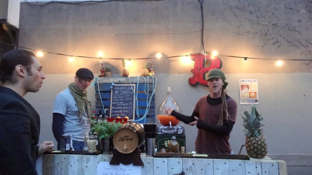 The guys at the Unorthobox bar serving up Junkyard Juice, 4th May 2013. Image courtesy Kelise Franclemont.