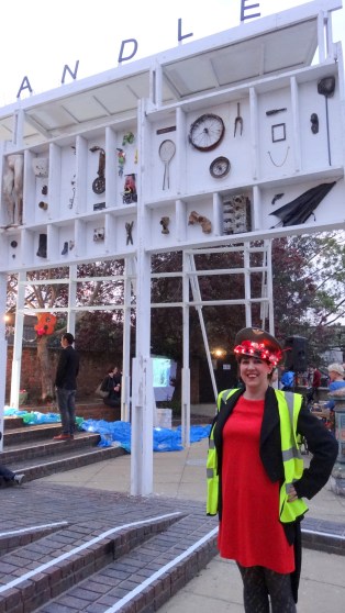 Eleanor Barrett, a co-director of The Brick Box, in front of 'The Cabinet of Curiosities', at Wandsworth Arts Festival Hub. Image courtesy Kelise Franclemont
