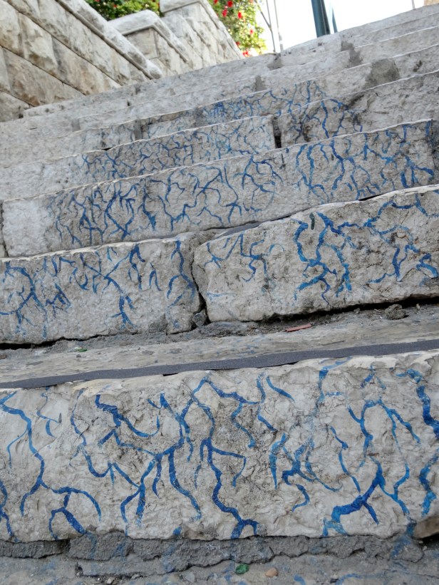 Detail of installation by Gabi Stein and Dalia Malin, 2011, leading up and away from a small courtyard, in Wadi Nisnas, Haifa, Israel. Image courtesy Kelise Franclemont. 