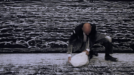 Neville Gabie, 'Experiments in black and white VII', 2013, video and chalk, in 'Jerwood Drawing Prize 2013' at Jerwood Space, Bankside, London. Photo courtesy the artist and www.artfund.org