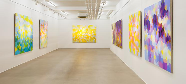 Installation view of 'Samia Halaby - New Paintings' at Ayyam Gallery, London. Image courtesy Ayyam Gallery.