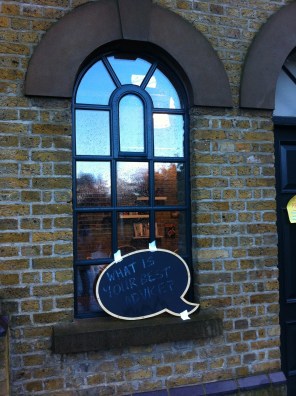 'What is your best advice?', the sign in the window at The Pumphouse Gallery, Battersea Park, London. Photo credit Kelise Franclemont.