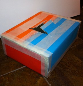 My touchy-feely box, made from an Amazon carton, some coloured paper and a bit of masking tape. Image courtesy Kelise Franclemont.