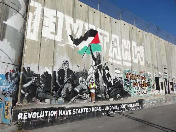 The Wall in Bethlehem, on the way to Jerusalem. 'The revolution has started here...and will continue...'