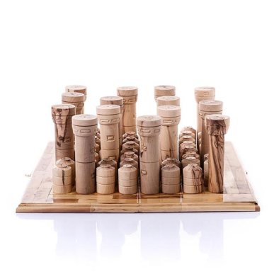 'Watchtowers and Watertanks game', olive wood, size variable. Designed by Mark Jan Van Tellingen, carved by Majed Abu Farha and Nader Rishmawee. Image courtesy the artist and Disarming Design.