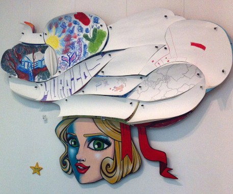 Consuelo, 'Hat Dream', 2014, paint, glue, ink in which the visitor paints or draws their dreams on sections of the hat, to leave or take home, in 'The Anti-Gallery Gallery Show' at Espacio Gallery, Bethnal Green, London. 