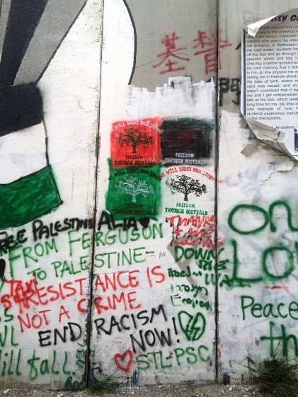 Detailed view of graffiti on the apartheid wall on the course, Palestine Marathon 2015, Bethlehem, Palestine (Occupied Territories). Photo credit Kelise Franclemont.