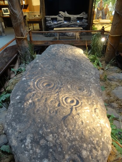 'Art in Stone', a fine example of 'petroglyphs' (rock carvings) likely from the Mississippian tribes from AD900-AD1500, at Funk Heritage Center at Reinhardt University, Waleska, Georgia. Photo credit Kelise Franclemont.