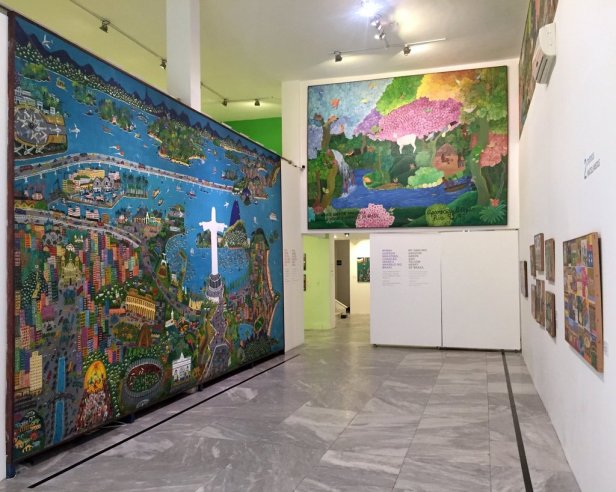 (left) Lia Mittarakis, 'Rio de Janeiro, I like you and your happy people', 1983-88, acrylic on canvas and wood, (right) Aparecida Azedo, 'My darling Amazon, green and yellow heart of Brazil', 1992-3, Acrylic on canvas and wood, Museu Internacional de Arte Naïf do Brasil, Rio de Janeiro. Photo: Kelise Franclemont.