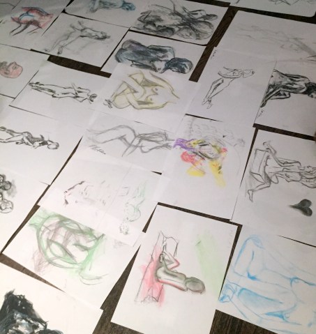 Finished drawings, at Drink-and-Draw at The Exhibit. Image courtesy the artists.